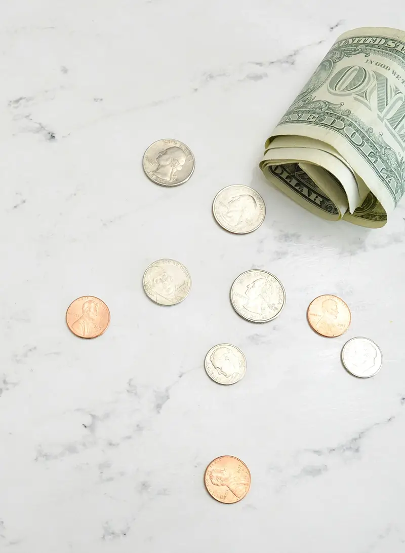 Home-Main-optimized Bills and coins on countertop